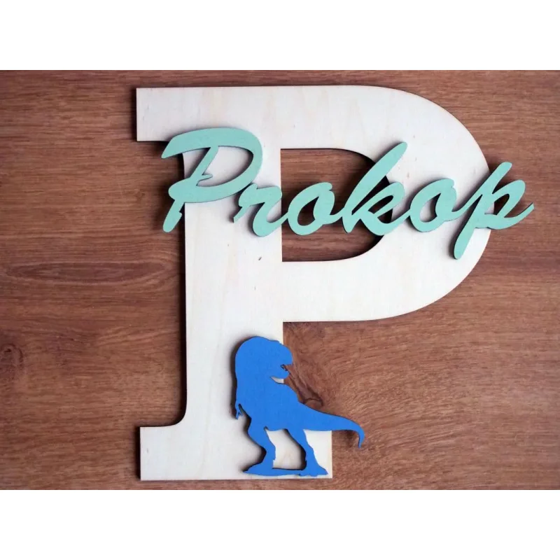 Monogram se jménem a dinosaurem