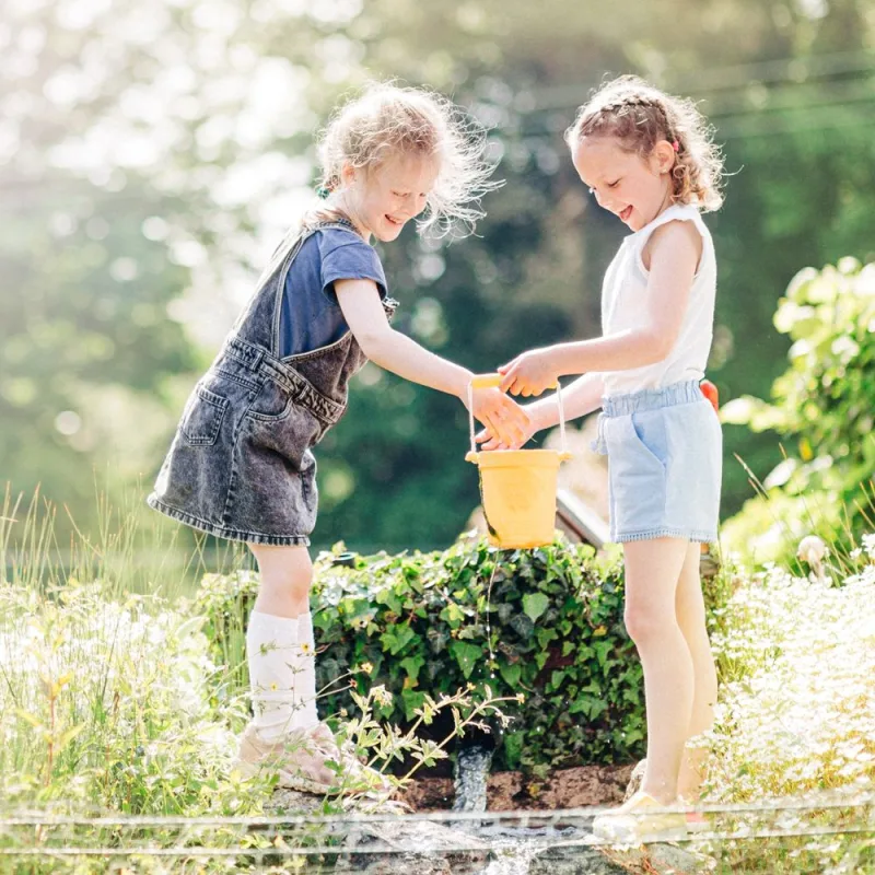 Bigjigs Toys Silikónové vedierko žlté Honey