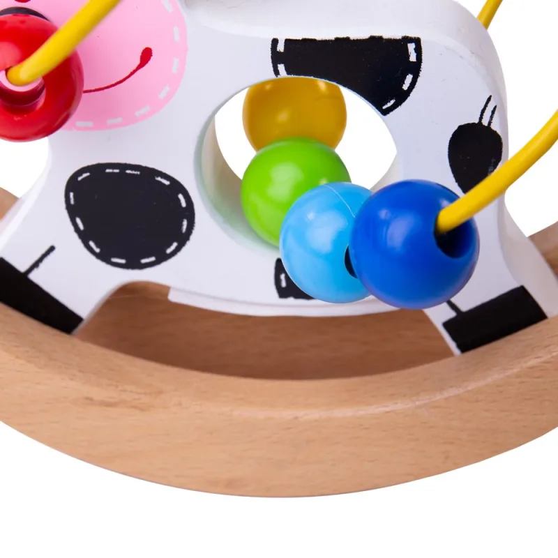 Bigjigs Toys Motorický labyrint na hojdačke - Kravička