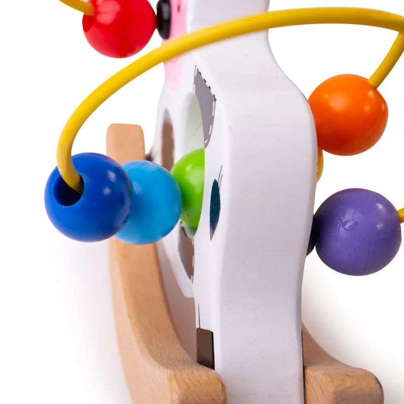 Bigjigs Toys Motorický labyrint na hojdačke - Kravička
