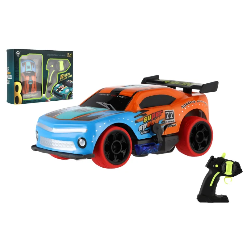 Teddies Auto RC športové plastové 2,4GHz 13cm na batérie oranžové v krabici 24x12x14cm